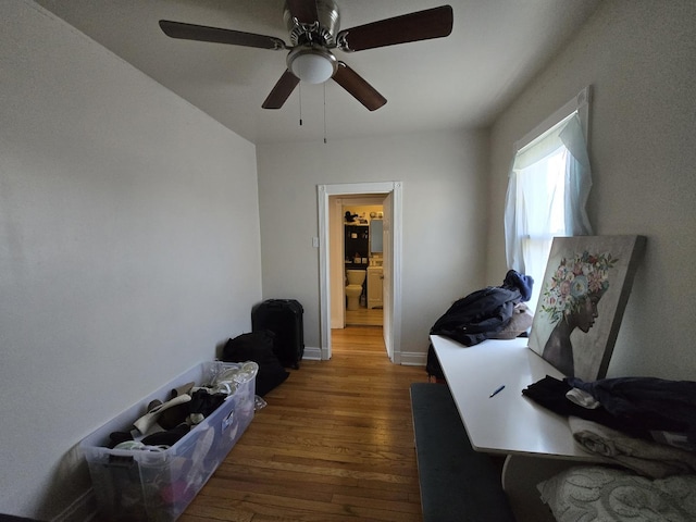 5750 W 65th St, Chicago, IL 60638 - interior space featuring baseboards, ceiling fan, and wood finished floors