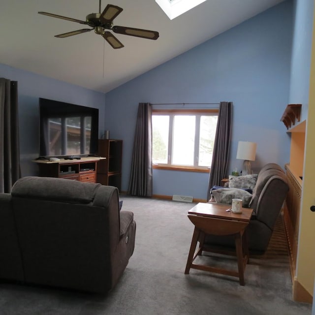 10902 E French St, Grant Park, IL 60940 - living area with baseboards, a skylight, high vaulted ceiling, light colored carpet, and ceiling fan