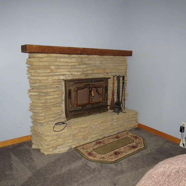 10902 E French St, Grant Park, IL 60940 - interior details with baseboards, a stone fireplace, and carpet