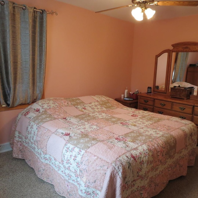 10902 E French St, Grant Park, IL 60940 - bedroom with visible vents, ceiling fan, and carpet flooring