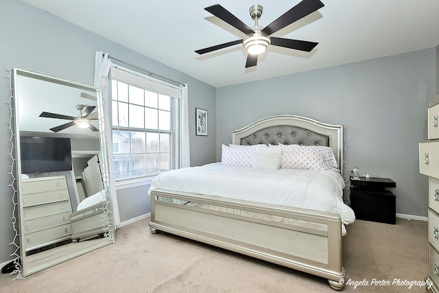 bedroom featuring baseboards, carpet flooring, and ceiling fan