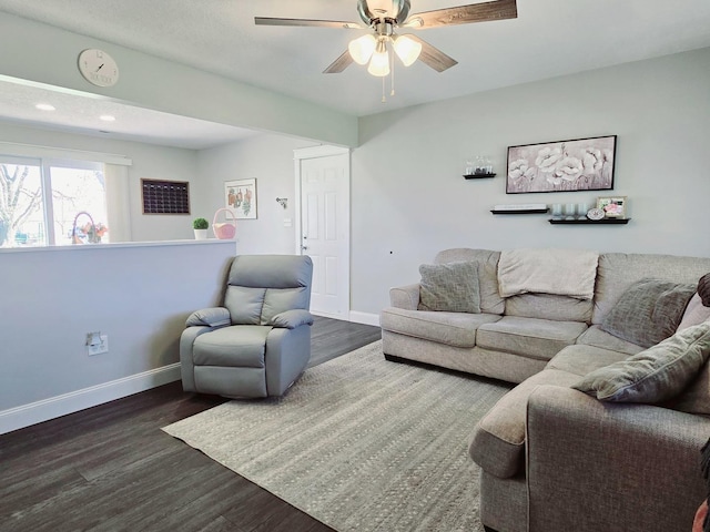 living room featuring recessed lighting, baseboards, a ceiling fan, and wood finished floors