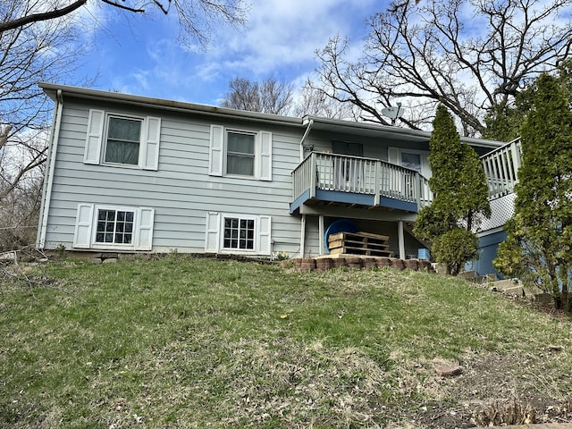 rear view of house with a lawn