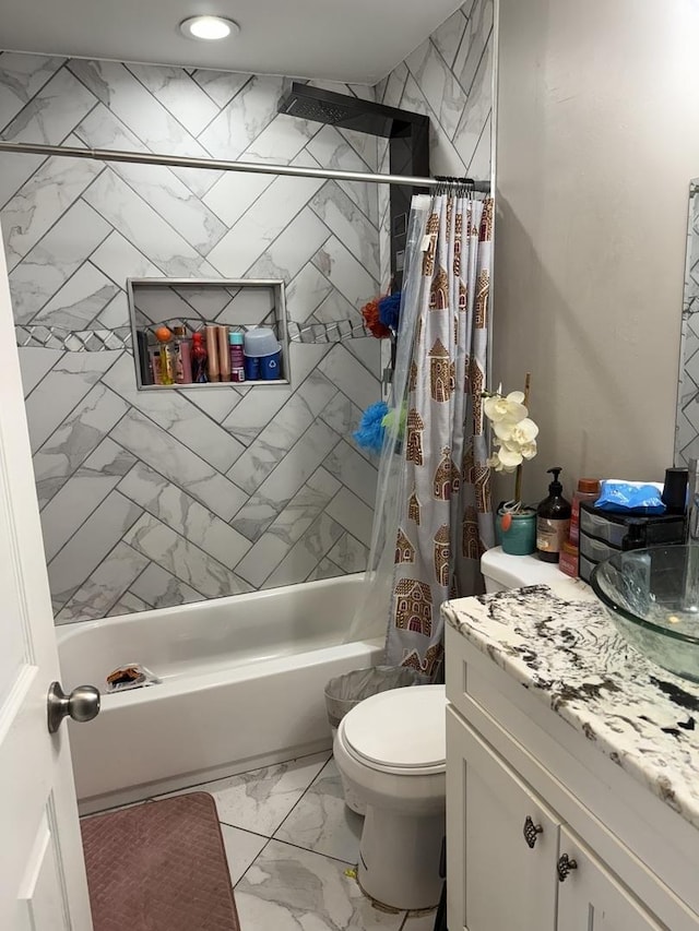bathroom featuring shower / bath combo with shower curtain, vanity, marble finish floor, and toilet