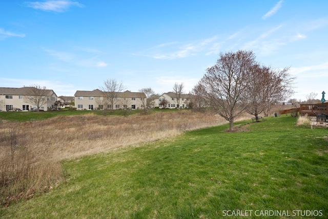 view of yard featuring a residential view