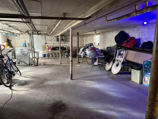 basement featuring electric panel