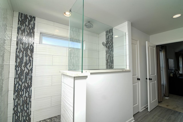 full bath with wood tiled floor and walk in shower
