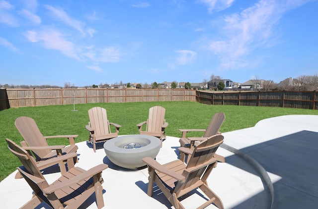 view of patio / terrace featuring a fire pit and fence