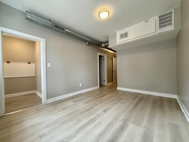 1824 W 22nd Pl, Chicago, IL 60608 - unfurnished room featuring light wood-style flooring and baseboards