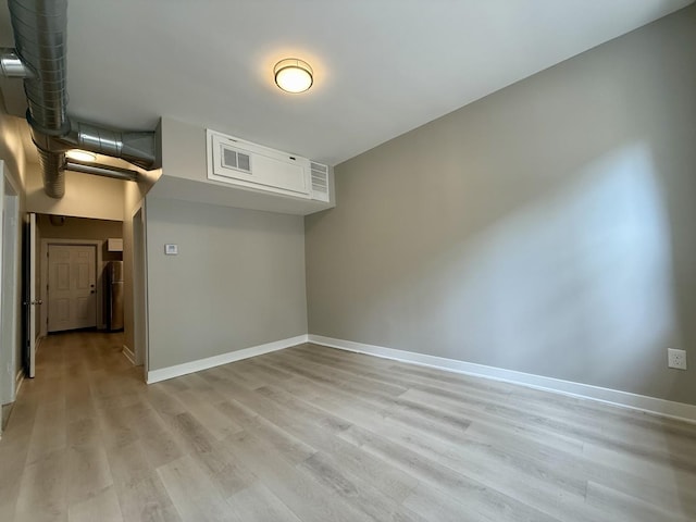 1824 W 22nd Pl, Chicago, IL 60608 - spare room with light wood-style flooring and baseboards