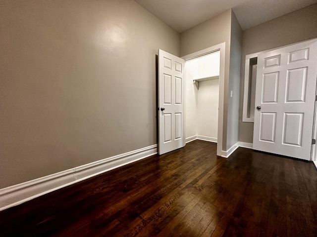 1824 W 22nd Pl, Chicago, IL 60608 - unfurnished bedroom with dark wood-style flooring