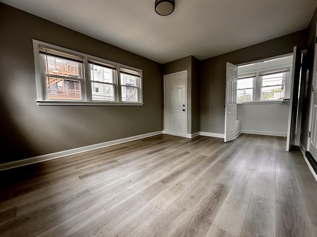 1824 W 22nd Pl, Chicago, IL 60608 - spare room featuring wood finished floors and baseboards