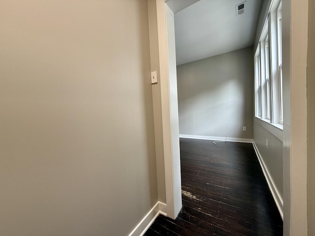 1824 W 22nd Pl, Chicago, IL 60608 - spare room with dark wood-style floors and baseboards