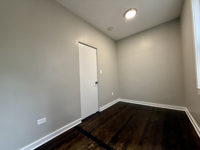 1824 W 22nd Pl, Chicago, IL 60608 - unfurnished room with dark wood finished floors and baseboards