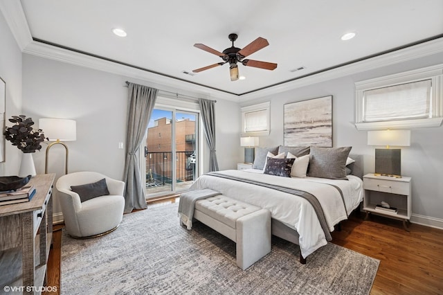 bedroom featuring visible vents, ornamental molding, access to exterior, and wood finished floors