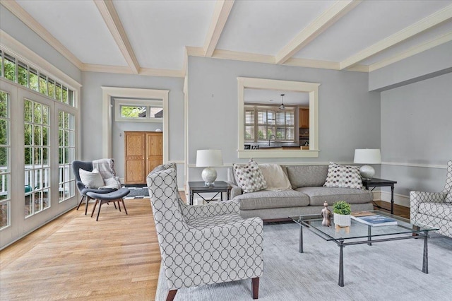 820 Lake Ave, Wilmette, IL 60091 - living room with wood finished floors, beamed ceiling, and crown molding