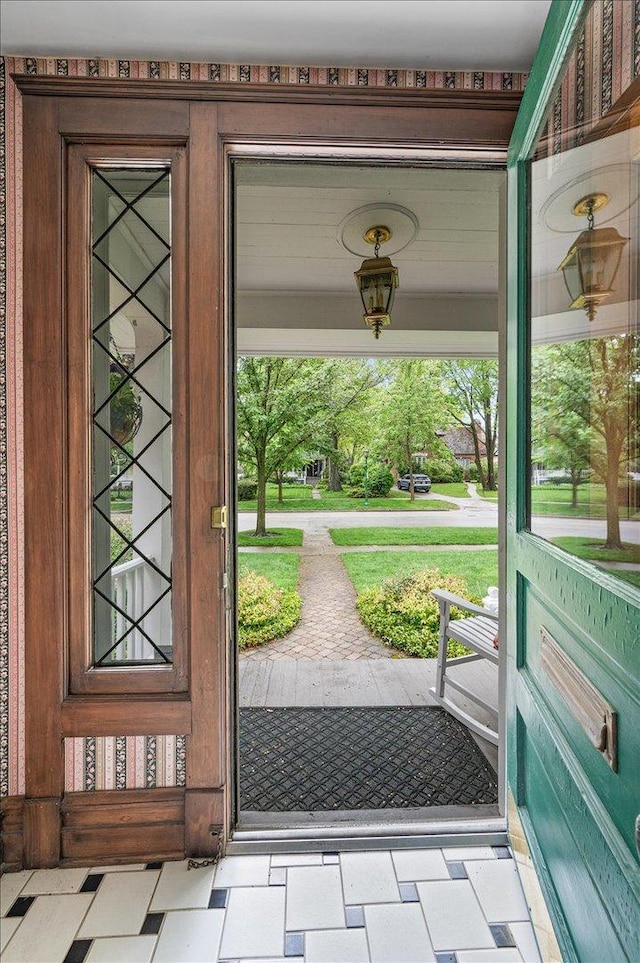 820 Lake Ave, Wilmette, IL 60091 - foyer with healthy amount of natural light and tile patterned floors