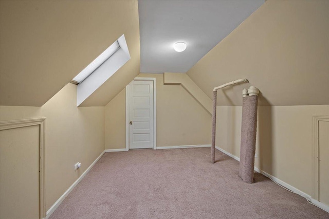 820 Lake Ave, Wilmette, IL 60091 - bonus room with carpet, vaulted ceiling, a skylight, and baseboards
