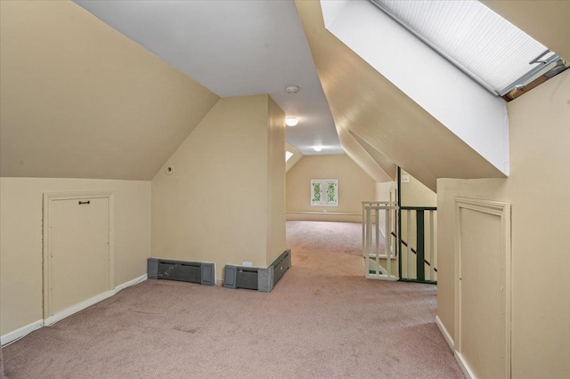 820 Lake Ave, Wilmette, IL 60091 - additional living space featuring carpet flooring, vaulted ceiling, and baseboards