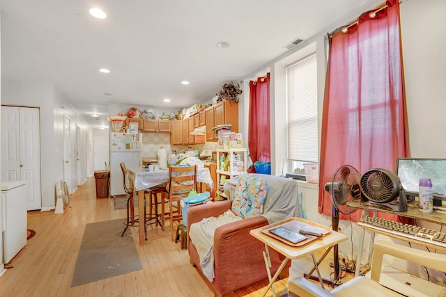 1234 S Karlov Ave, Chicago, IL 60623 - living area with light wood finished floors, visible vents, and recessed lighting