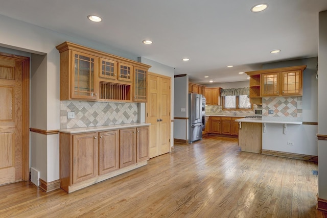 1616 N Dale Ave, Arlington Heights, IL 60004 - kitchen with light wood-type flooring, a peninsula, open shelves, light countertops, and high end fridge