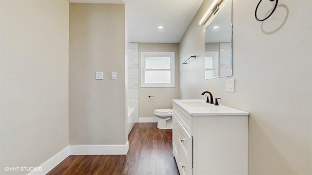 226 W Highland Dr, Chicago Heights, IL 60411 - bathroom with vanity, baseboards, shower / bath combination, toilet, and wood finished floors