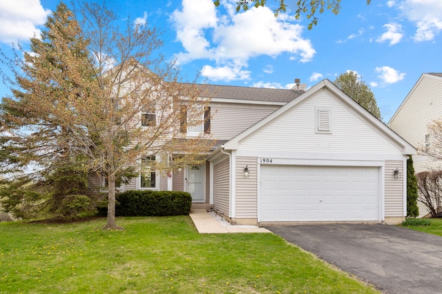 1904 Heron View Way, Round Lake, IL 60073 - view of front of home featuring asphalt driveway, a front yard, a garage, and a chimney