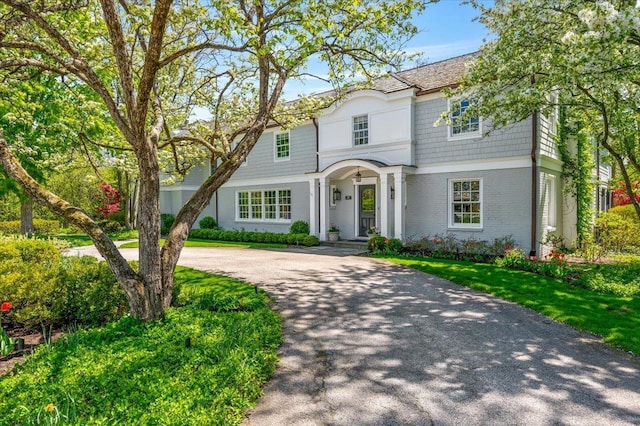 280 Old Farm Rd, Northfield, IL 60093 - shingle-style home with brick siding and curved driveway