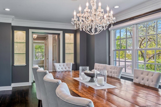 280 Old Farm Rd, Northfield, IL 60093 - dining area with healthy amount of natural light, a chandelier, crown molding, baseboards, and wood finished floors