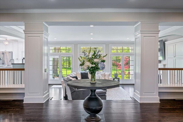 280 Old Farm Rd, Northfield, IL 60093 - dining space featuring french doors, decorative columns, dark wood-style flooring, ornamental molding, and a decorative wall