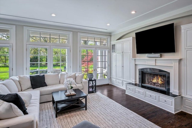 280 Old Farm Rd, Northfield, IL 60093 - living area featuring french doors, a high end fireplace, dark wood-style floors, recessed lighting, and crown molding