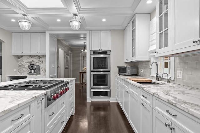280 Old Farm Rd, Northfield, IL 60093 - kitchen with stainless steel appliances, a sink, white cabinets, recessed lighting, and dark wood-style floors