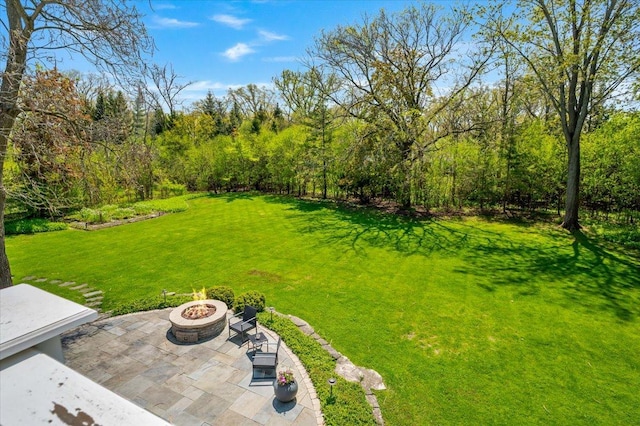 280 Old Farm Rd, Northfield, IL 60093 - view of grassy yard featuring an outdoor fire pit and a patio area