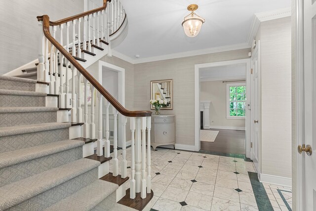 280 Old Farm Rd, Northfield, IL 60093 - foyer entrance with baseboards, stairs, ornamental molding, and a fireplace