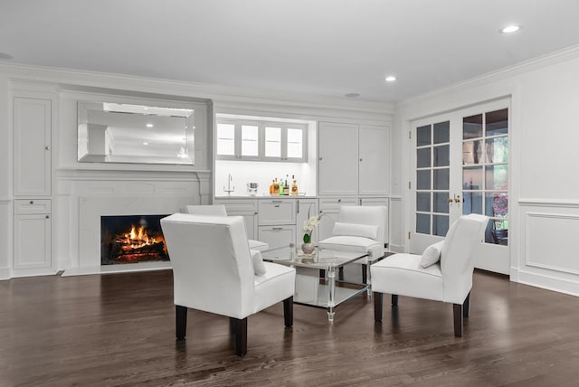 280 Old Farm Rd, Northfield, IL 60093 - living area with bar area, ornamental molding, a decorative wall, dark wood finished floors, and recessed lighting