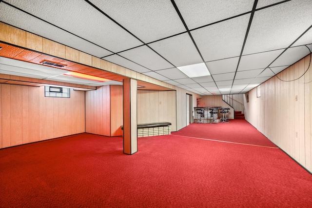 31 W 126th Pl, Chicago, IL 60628 - basement with a bar, wood walls, a drop ceiling, and carpet floors