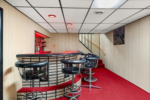 31 W 126th Pl, Chicago, IL 60628 - bar featuring a bar, stairs, visible vents, carpet, and a drop ceiling