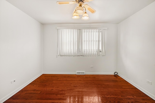 31 W 126th Pl, Chicago, IL 60628 - unfurnished room with wood finished floors, baseboards, a ceiling fan, and visible vents
