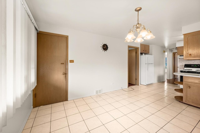 31 W 126th Pl, Chicago, IL 60628 - kitchen featuring light tile patterned floors, white appliances, open shelves, visible vents, and a chandelier