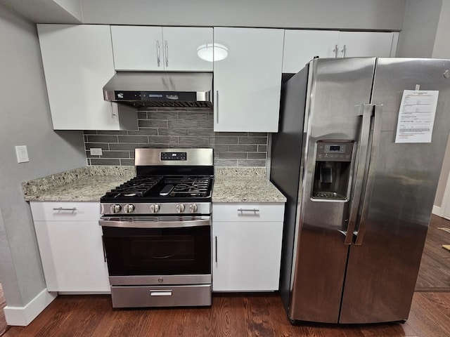 kitchen with under cabinet range hood, dark wood-style flooring, and stainless steel appliances
