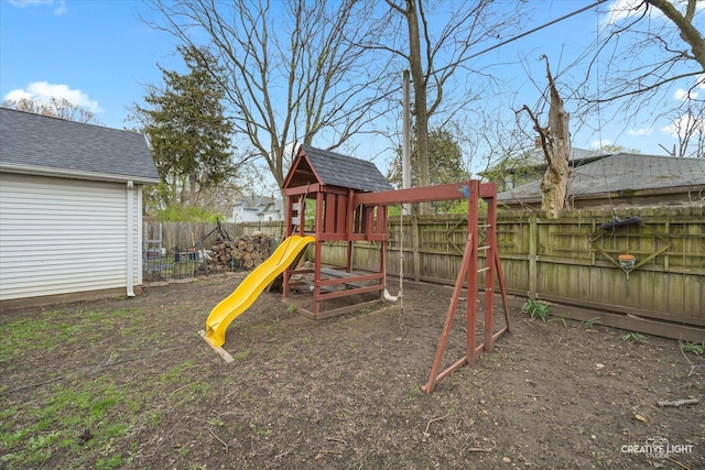 627 S Main St, Montgomery, IL 60538 - view of playground with a fenced backyard