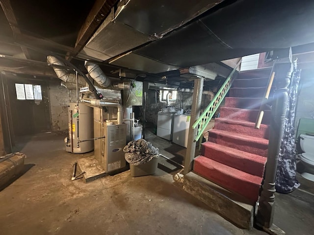 238 Ann St, West Chicago, IL 60185 - basement featuring stairs, heating unit, washer and clothes dryer, and gas water heater