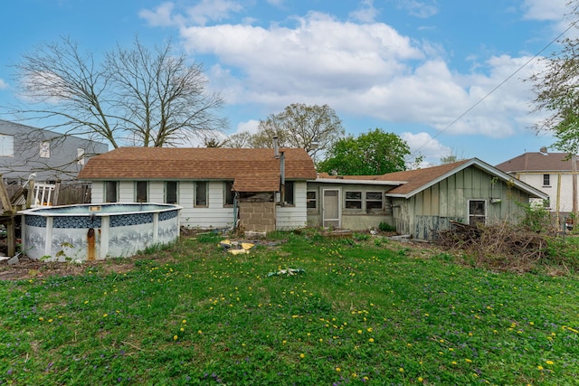 back of property featuring fence