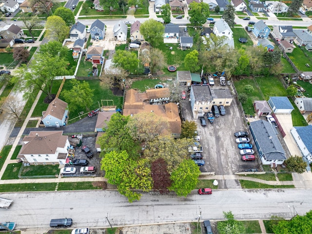 view of side of property featuring fence, a playground, and a lawn