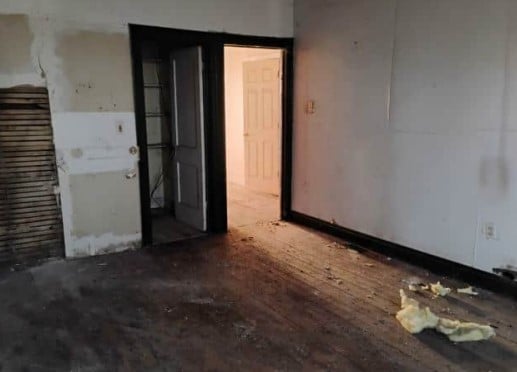 spare room featuring wood finished floors