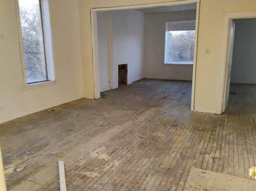 spare room with wood-type flooring