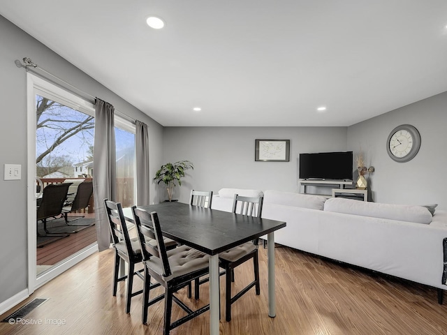 133 Abbeywood Cir, Streamwood, IL 60107 - dining space with light wood-style floors, recessed lighting, visible vents, and baseboards
