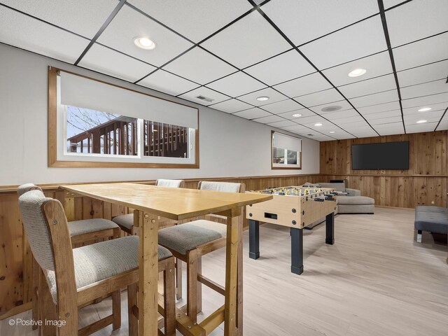 133 Abbeywood Cir, Streamwood, IL 60107 - game room with light wood-style flooring, wooden walls, visible vents, and recessed lighting
