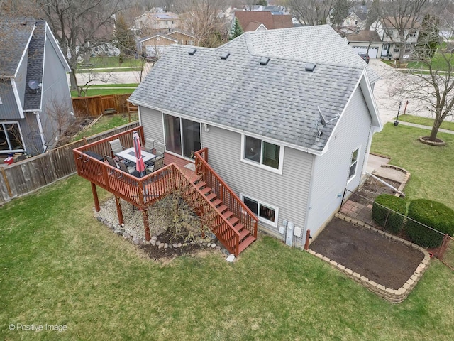 133 Abbeywood Cir, Streamwood, IL 60107 - rear view of house featuring a yard, a wooden deck, stairs, and roof with shingles