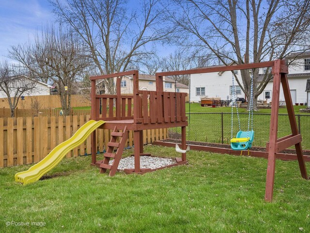 133 Abbeywood Cir, Streamwood, IL 60107 - view of playground with a yard and fence